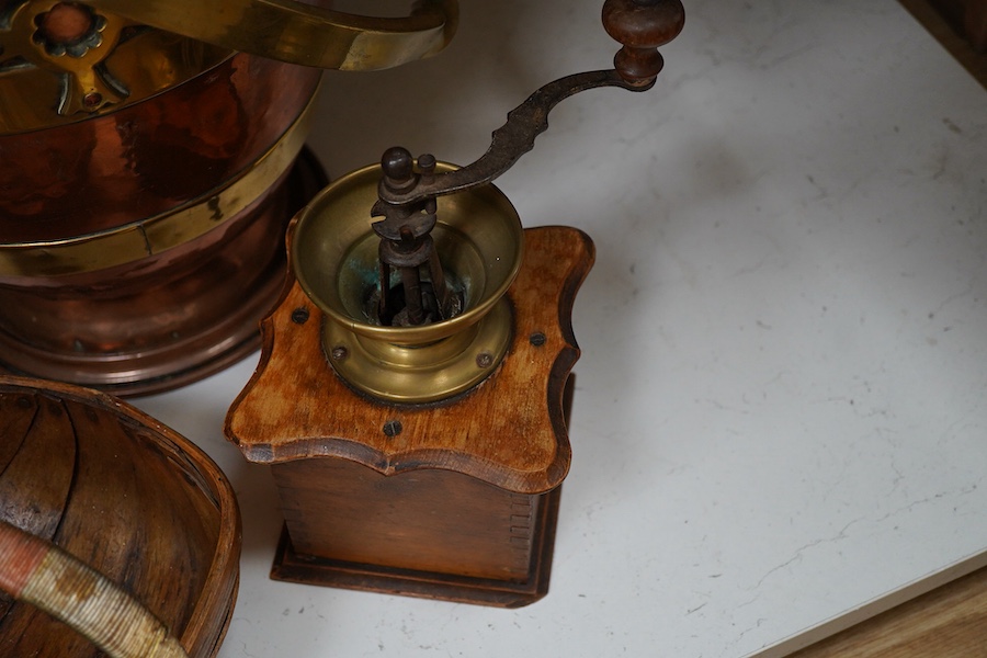 Brass and copper pedestal log-box three Sussex trugs and coffee mill, log box 32cm high